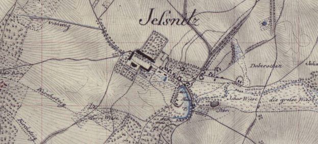 Ein detailliertes altes Stadtplan von Jelsnitz, Deutschland, mit einem Gebäude in der Mitte und umgeben von Text, das Straßen, Gebäude und andere Gebietmerkmale zeigt.