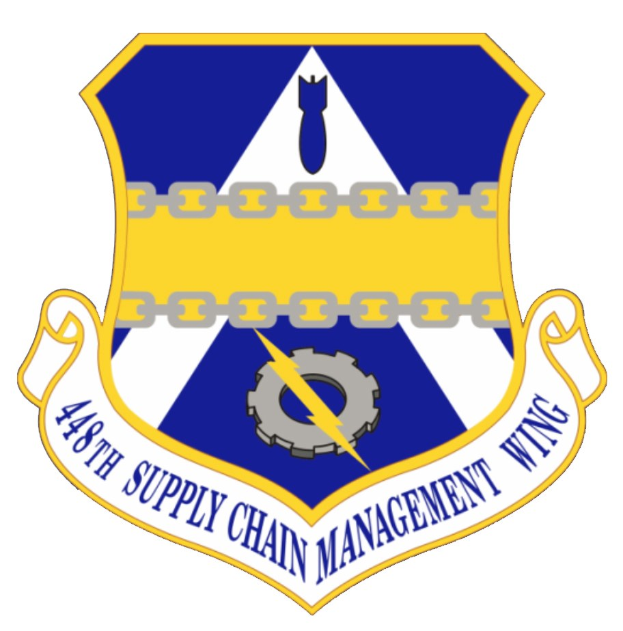 Logo der 48. Versorgungsmanagement-Flügel mit einem blauen Schild, einem weißen Stern und einem weißen Banner mit der Aufschrift "Versorgungsmanagement" in Blau, alles umrandet von Weiß mit schwarzer Schrift.