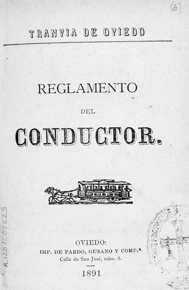 Altes Buch mit dem Titel 'Reglamento de Conductor' mit einer Zugillustration auf dem Cover und einem Stempel auf der rechten Seite.