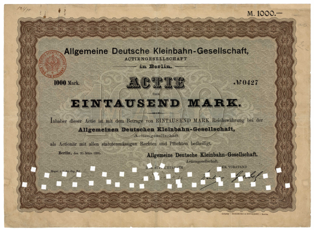 Ein altes deutsches Wertpapier, das von der deutschen Regierung ausgegeben wurde und Text sowie einen Stempel enthält.