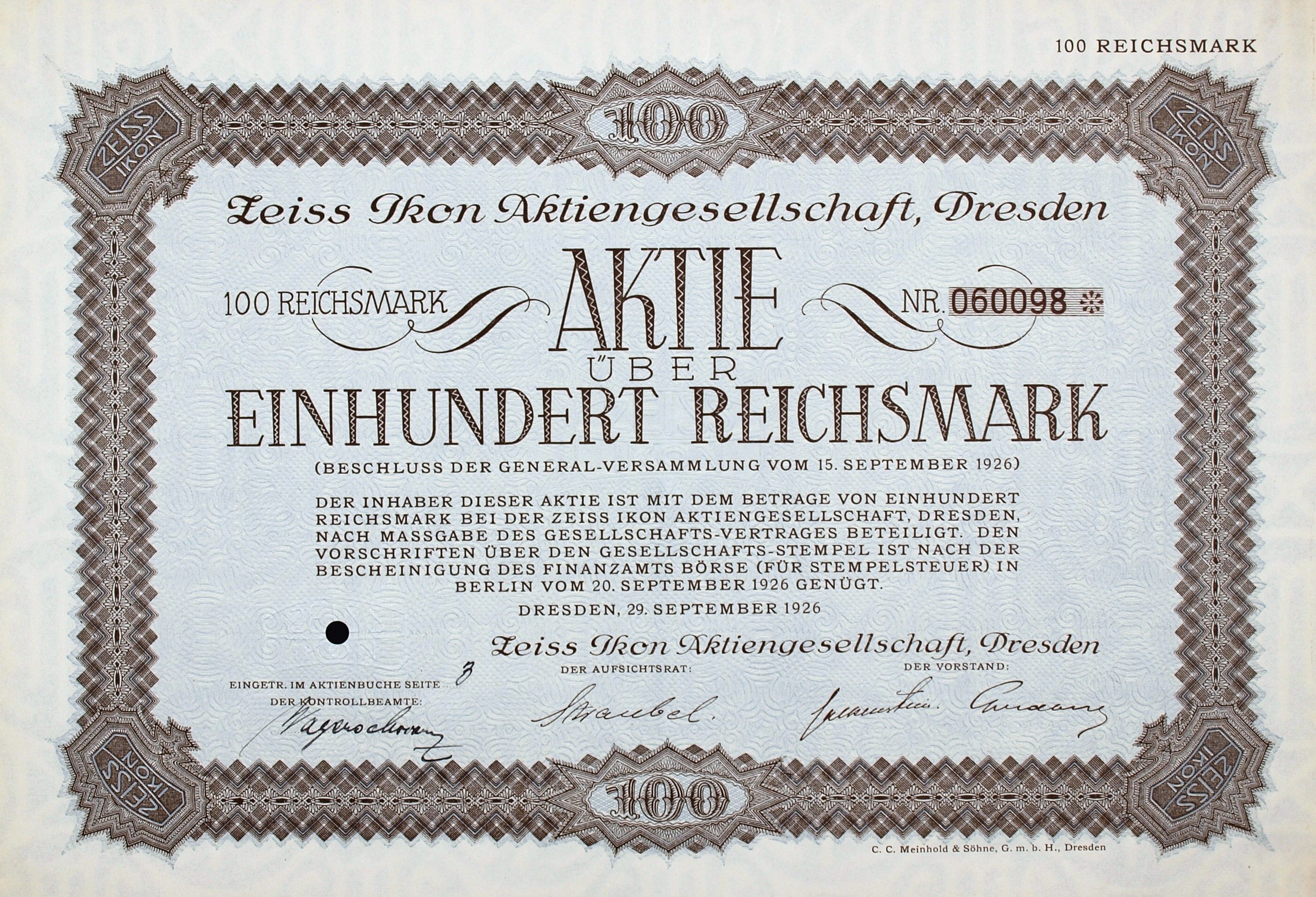 Altes deutsches Aktienzertifikat für 100 Reichmark mit schwarzem Rand und gedrucktem Text.