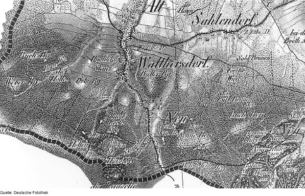 Eine detaillierte Schwarz-Weiß-Karte von Schleswig-Holstein, die Straßen, Gebäude und Sehenswürdigkeiten zeigt.