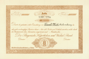 Alter Aktienschein mit goldener Einfassung, der ein Männerporträt, Text und wahrscheinlich eine Anleihebezeichnung zeigt.