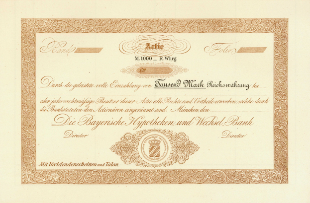 Altes Aktienzertifikat mit goldenem Rand, das ein Porträt eines Mannes und Text enthält, der darauf hinweist, dass es eine Anleihe ist.