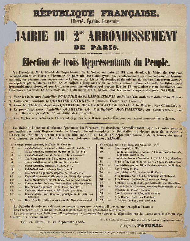 Eine schwarz-wei├če Zeitung mit dem Bild eines Mannes und einer Wahlurne.