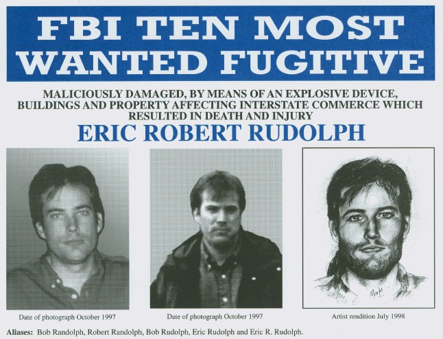 FBI Ten Most Wanted Fugitive Eric Robert Rudolph poster with three photos of different individuals and black background with white text.